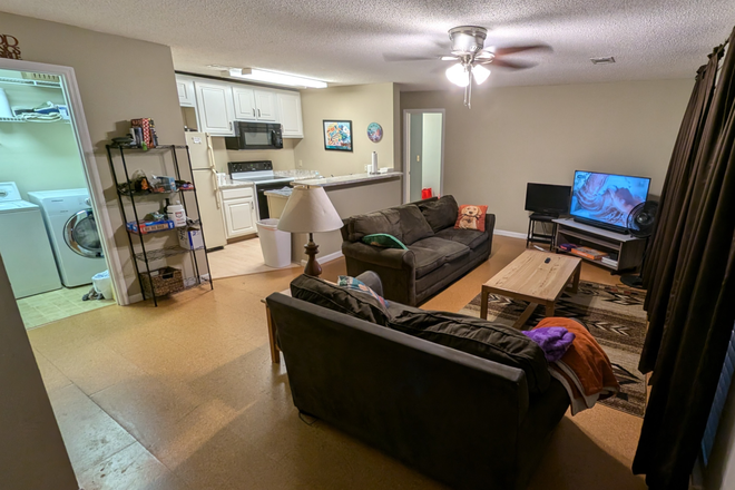 Living Room - Tillman Place Apartments (walk to campus)