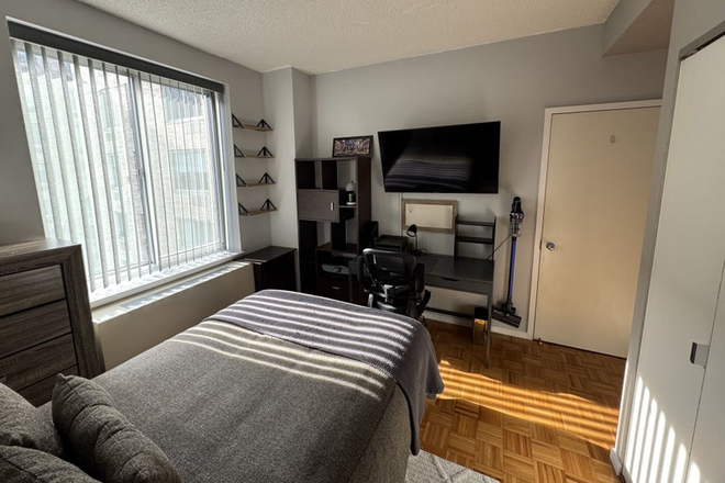 Photo of Bedroom from Corner - Furnished Room w/Amenities Uptown