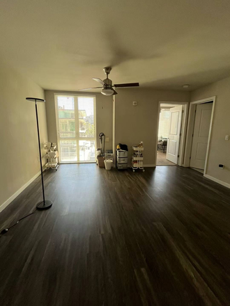 Living room. Two sets of desks and chairs provided. - 5-min Walk from Campus: Stonefire Summer Sublet Apartments