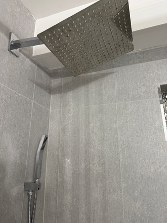 Shower Head - Furnished Basement, All Utilities Included - $2000 Apartments