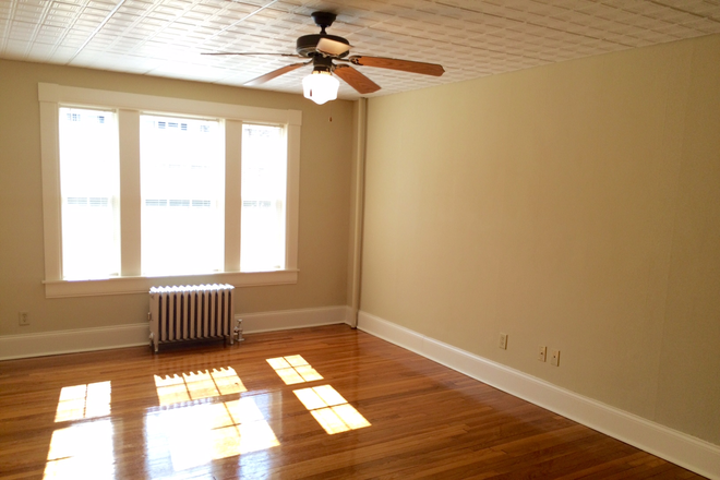 Living space - Avail 2/1/25 Renovated Jr 1 bdrm featuring hardwood flrs balcony yard farmers sink on-site laundry Apartments