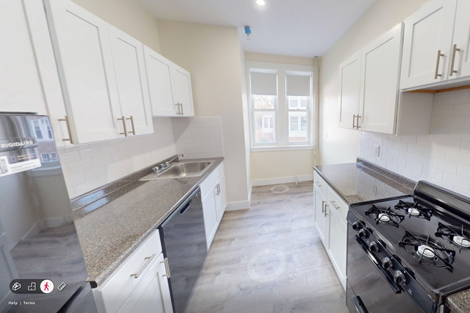 Visit hubrealtyproperties.com - Light and bright, front facing corner unit  2 bedroom split, with newly updated kitchen