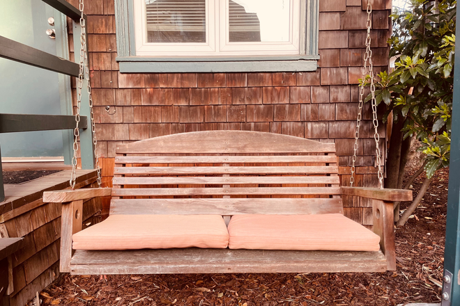 Cottage Front entry w porch swing - Stand alone "in-law" Cottage Walking Distance to Campus and Downtown