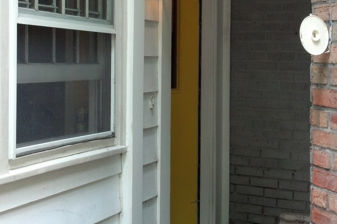 Tenants' entrance - Livingroom plus bedroom, shared full bath, laundry, kitchen, dining area, pocket garden House