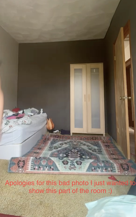 Bed and closet portion of room- bedframe, side table and wall coverings not shown but are included with room. - Bedroom in spacious home close to Tufts campus