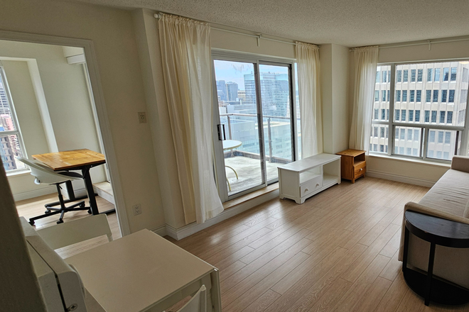 Open-concept living/dining - Bright one bedroom on Bay