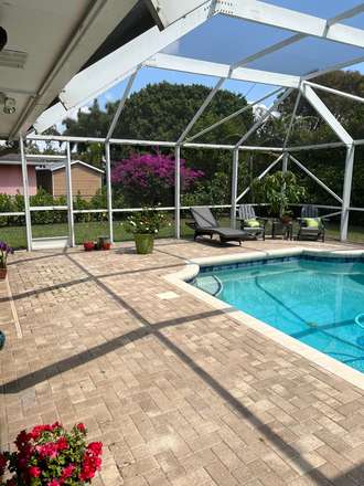 Patio/Pool - 4BR Pool Home Near NSU – Updated, Heated Pool & Flexible Living Options