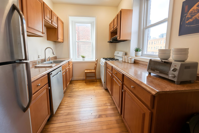 Call NOW for showings! 617-236-8600 - VANCOUVER ST - GORGEOUS RENOVATED LONGWOOD AREA BROWNSTONE 4BR/1BA FOR *9/1/2026* W/ LNDRY IN BLDNG Apartments