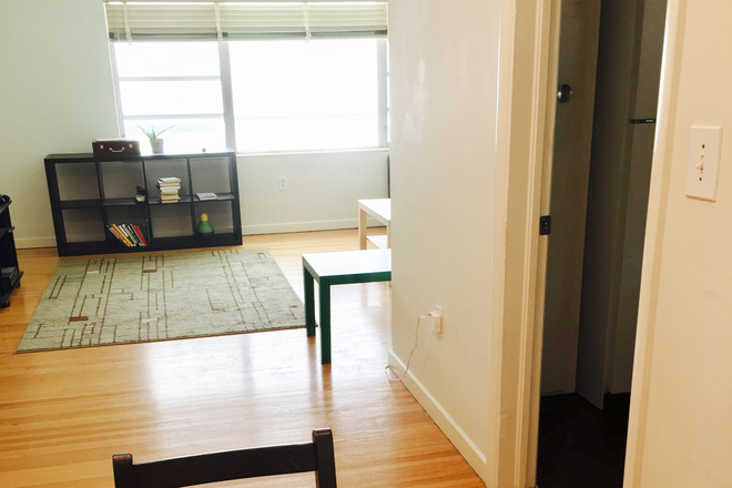 Dining area to Living Room - Large 3bed/1bath w/ parking, AC, in-unit laundry, yard, 1400sq ft Duplex