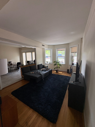 Living Room 1 - 1 Room Available in a Sunny 2 Bedroom Apartment Near the T