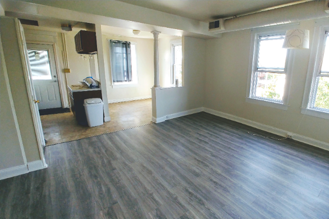 Living room and dining - Sunny 2Br/1Bth near Hopkins Apartments