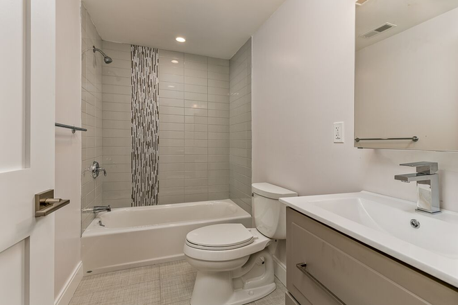 . - Newly Renovated, 6 bed 4 full bath, W/D in unit, Central AC, Close to Trains Apartments
