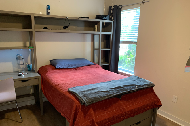 Bed with window - Copper Social Apartments