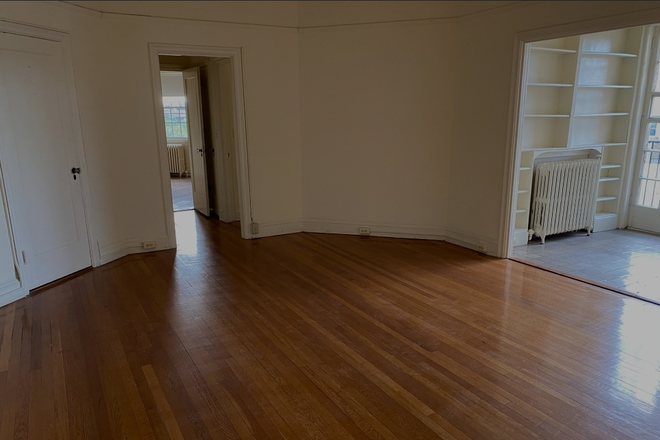 Living room. will be furnished - 100 West Apartments