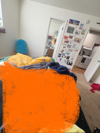 View of room/bathroom/kitchen while furnished. Nightstand and bookshelf included but not pictured - Timber Ridge Apartments