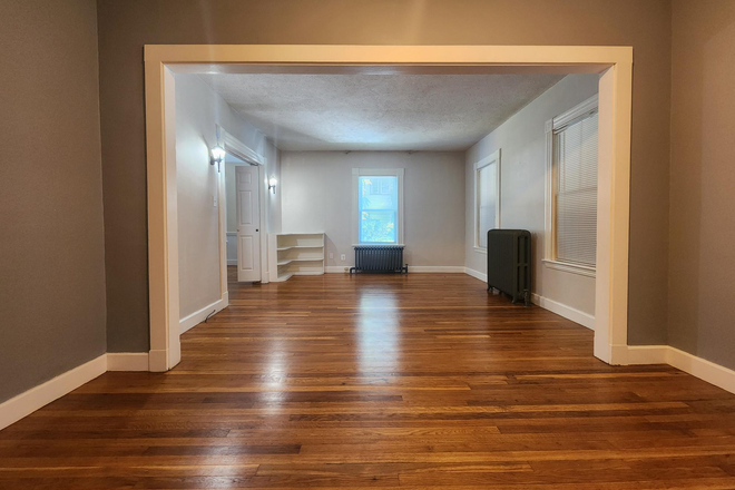 Living room - Commuters: Spacious 1,100 sq ft 2BR Great Quincy location - 5 Min Walk to Red Line - Heat included Apartments