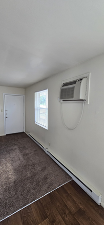 Living room and front door - Launch Apartments - 1bed w/ private bathroom in 2 bed apartment (pets allowed)