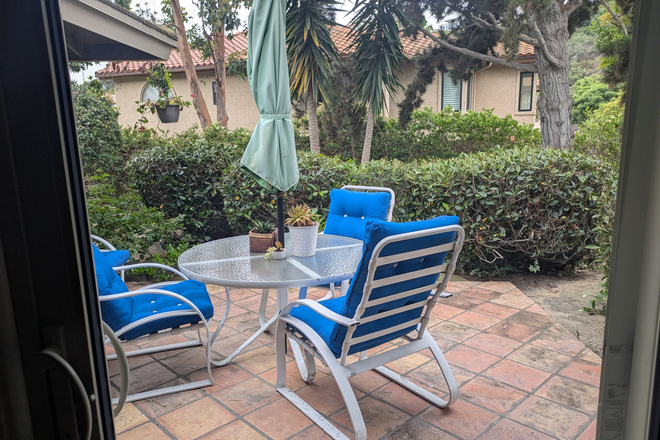 Patio outside bedroom for use by tenant. - Room/bath/separate entrance in pleasant home filled with music and art