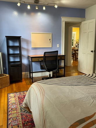 bedroom, desk and storage - Spacious room in beautiful home near BC, BU; 65Bus to Longwood Medical area. Female tenants only