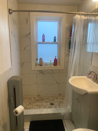 Bathroom 1st floor. - 50 Curtis Ave, Somerville.  4 bed apartment