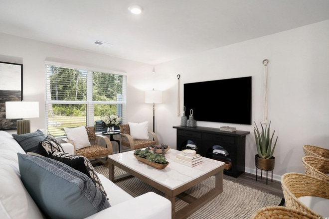 Living room - The Townes At Amber Bluff Townhome