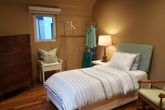 Bedroom faces south.  Window in this photo faces west. - Sunny/quiet/clean furnished bedroom in home ($950 all inclusive) - Female - Transit steps away