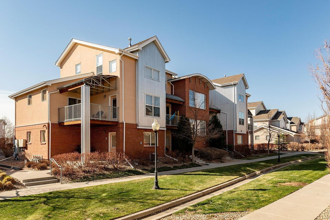 exterior with porch - Lowry Townhome, center of the neighborhood. walkable to restaurants, shops, parks.