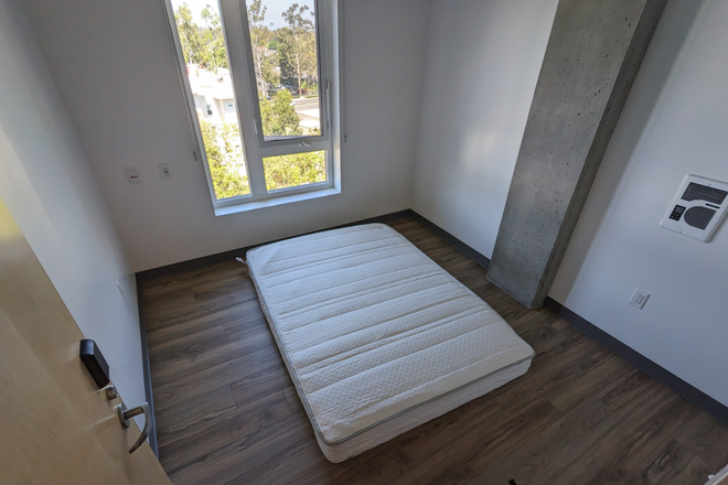 Bedroom. There will be a desk and a bed frame/mattress. But I can move my stuff to the living room if you don't want them. - UCI Grad Housing Sublease 06/16 - 09/19 (Verano Towers) in a 4-bedroom unit.