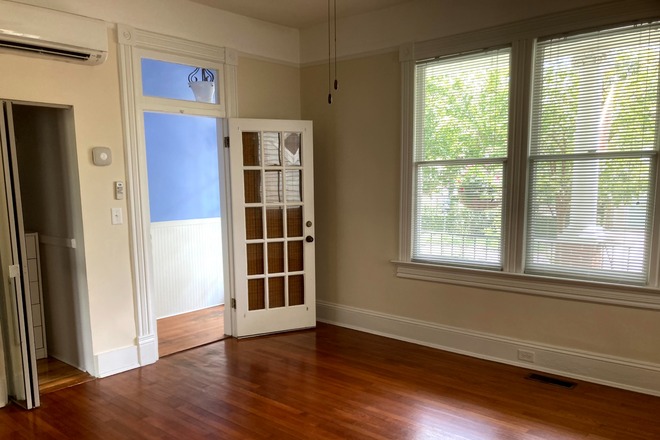 Entry from front porch into main room. - Nice, 1 bedroom studio apartment on neighborhood street a block from MUSC