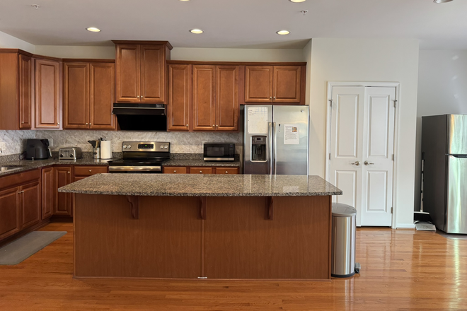 Kitchen - Furnished Bedroom in a Greenbelt Station Townhome