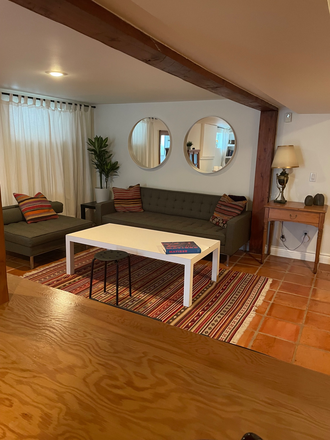 Living room - Little Italy. Bright lower level one bedroom apartment