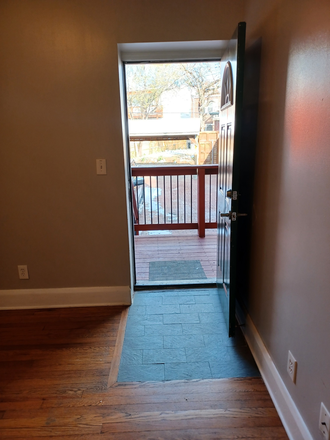 Back door out to deck - Grove Townhouse Apartment