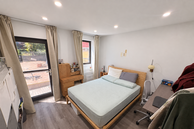 Primary bedroom - Owner-Quality Furnished Garden Duplex | 1,450 SF | 2BR + Flex | Private Backyard Duplex