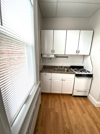 Kitchen - Large, Sunny 1 Bedroom Apartment. Walk to Brown. Heat and Hot Water Included.