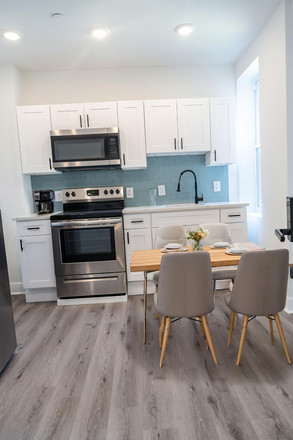 Kitchen - NEWLY RENOVATED PROPERTY WITH TONS OF AMENITIES Triplex
