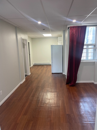 Living Room/Kitchen - Amazing  2-bedroom located near Bloor & Spadina steps from UofT.