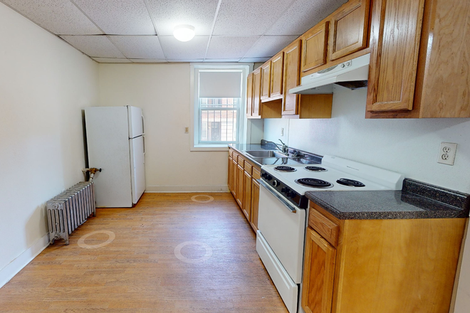 Visit hubrealtyproperties.com - Brighton, renovated 1 bedroom, basement level, with heat included