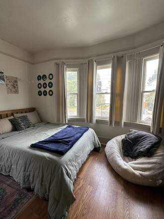 Full sized bed frame and mattress on this side of the double. Big Windows! - Sublet on Southside