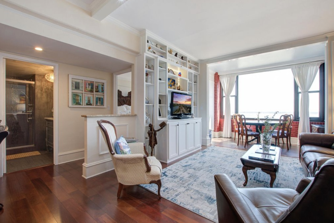 Living room - Stunning 10th-Floor Condo with Breathtaking Ashley River, Marina Views & Across from MUSC