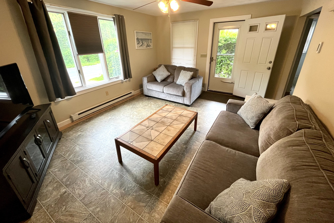 Living Room - Ultra-Modern  TownHouse,  Spring Semester 1/01/26-5/23/26  & now.  Immaculate 3 Bedrooms, 2 Baths!