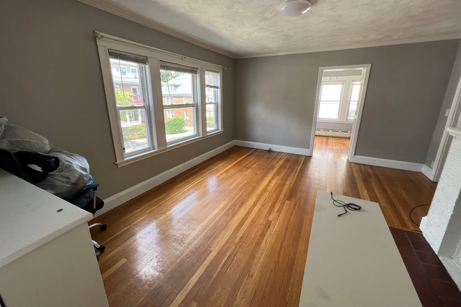 Living Room - *RENTING JUNIOR YEAR 2026-2027*  LARGE 5 BED 2 BATH HOUSE ON GERALD RD YARD - OFF STREET PARKING!!