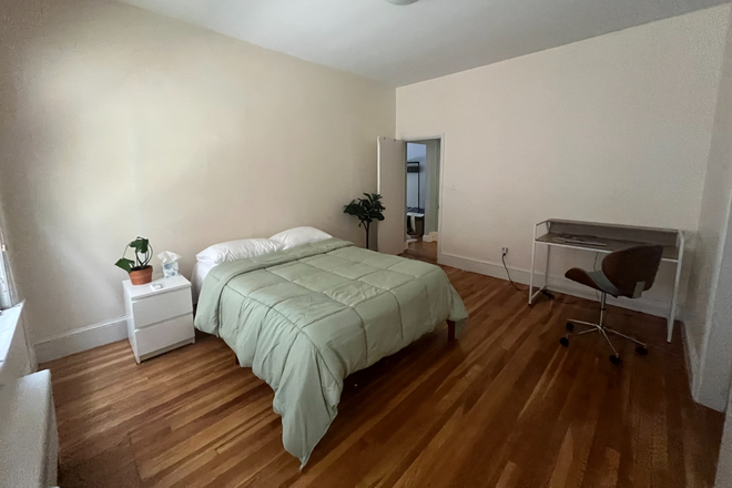 Primary bedroom is LARGE -- with desk, full-sized bed, nightstand etc. - Large bedroom, cozy furnished summer sublet -- 5min walk to Harvard, ALL UTILITIES INCLUDED