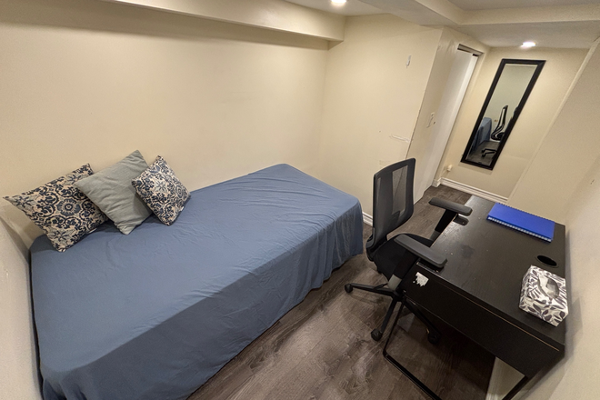 Room - Fully furnished room in a spacious two bedroom basement unit 10 minute walk from campus.
