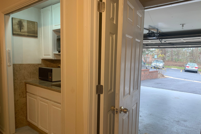 parking area - Basement Studio private entrance, full bath, kitchenette, garage parking, Across Braddock to GMU Townhome