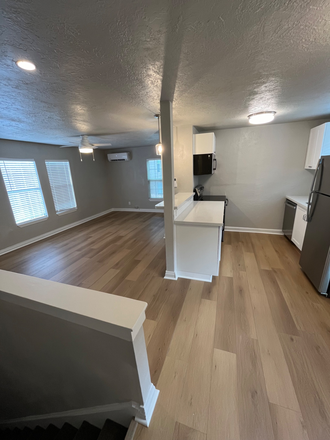 View from top of the stairs into kitchen - Recently remodeled 704 sq ft Montrose Garage Apartment