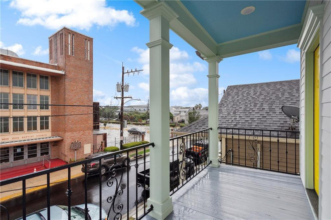 Front balcony - Gorgeous 2nd Floor Duplex in Historic Central City Duplex