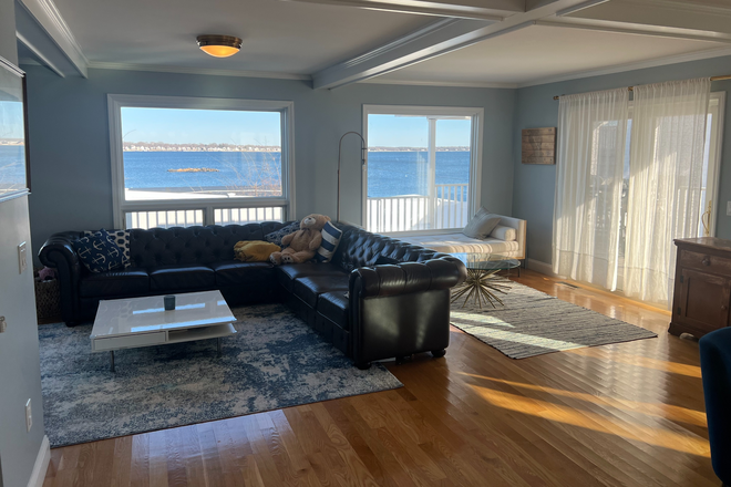 Water views from the living room - Large home with beautiful water views close to campus and TF Green