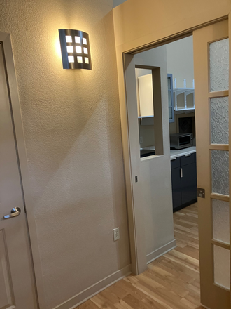 Entry space leading to main space - Sunny studio Townhome