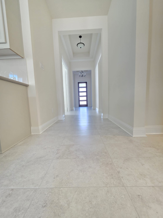 entry - Brand new single family home 4 brm 3 bath plus study with no rear neighbors