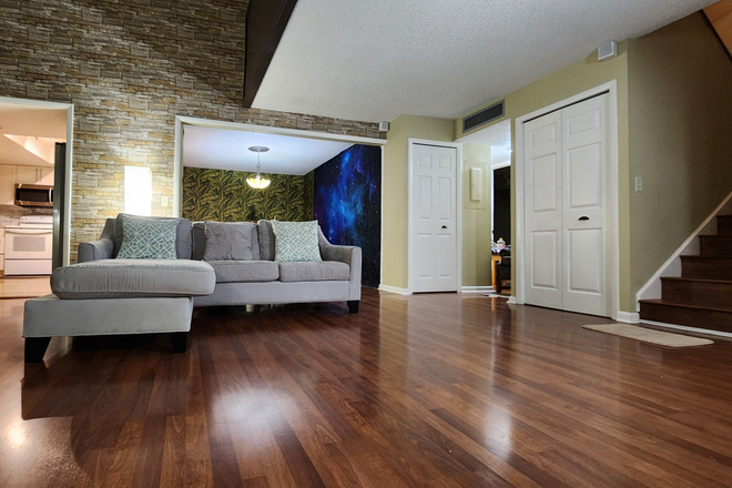 Living room - River Oaks 1 in gated community to provide its residents with security and privacy Condo